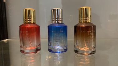 El rociador que sellaba el atomizador de cristal del espray de la botella de perfume 25ml modificó la impresión y el color para requisitos particulares