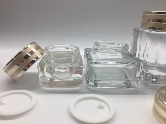 Los tarros de cristal del pequeño cuadrado clásico de lujo electrochapan la impresión con el casquillo metálico
