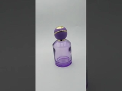 Botella de perfume redonda morada de 100 ml con tapón de bola redondo