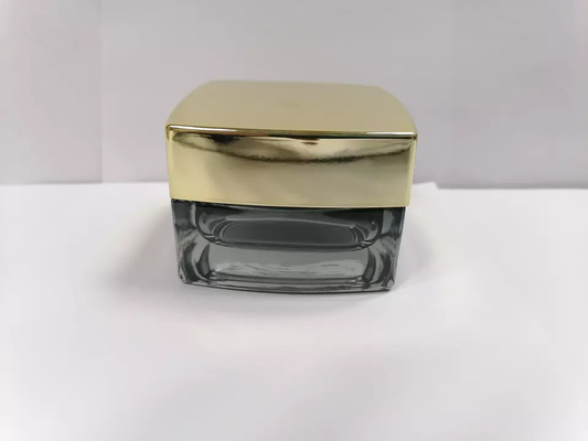 Tarros cosméticos de los tarros 30g 50g de Grey Color Lacquering Glass Skincare con las tapas del oro