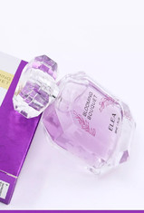 Las botellas de perfume de lujo vacías de cristal 100ml grabaron en relieve a Logo With Surlyn Cap