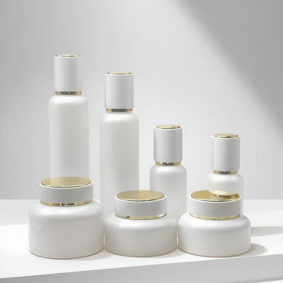 Precio de fábrica 50ml 100ml 120ml Envase de loción de vidrio Botella de vidrio con bomba de loción blanca vacía Juego corporal de crema para el cuidado de la piel