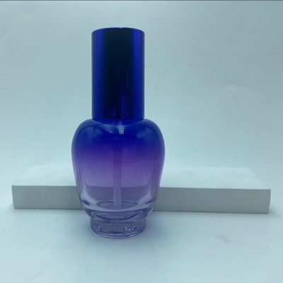 Botella de loción de vidrio 30ml Botella de suero de gradiente azul con bomba de aceite Botella de bomba Botella de cosmética OEM