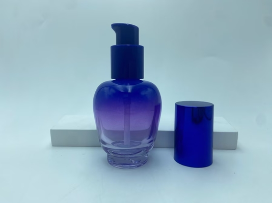 Botella de loción de vidrio 30ml Botella de suero de gradiente azul con bomba de aceite Botella de bomba Botella de cosmética OEM