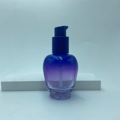 Botella de loción de vidrio 30ml Botella de suero de gradiente azul con bomba de aceite Botella de bomba Botella de cosmética OEM