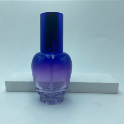 Botella de loción de vidrio 30ml Botella de suero de gradiente azul con bomba de aceite Botella de bomba Botella de cosmética OEM