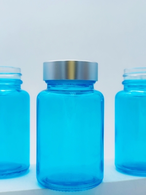 100 ml cápsula de vidrio botella de suplemento capilar botella redonda cápsula de vidrio para el suero ocular y el suero facial OEM