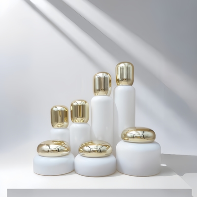 Envases cosméticos Botella de loción de vidrio Jar de crema Contenedores para el cuidado de la piel con tapa redonda de oro
