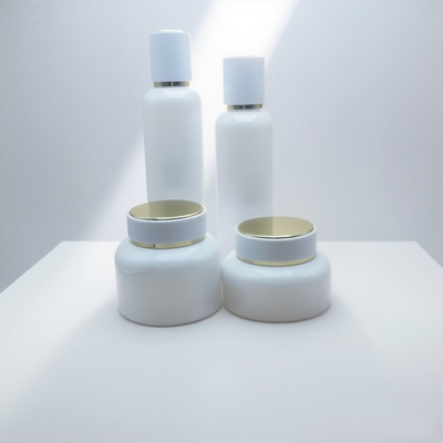 Precio de fábrica 50ml 100ml 120ml Envase de loción de vidrio Botella de vidrio con bomba de loción blanca vacía Juego corporal de crema para el cuidado de la piel