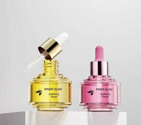 Botella cuentagotas de vidrio de dos tonos de lujo de 30 ml Nuevo diseño elegante y mejorado para botella de aceite de esencia para el cuidado de la piel