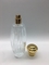 Las botellas de perfume vacías altas de lujo 100ml prensan el rociador con el casquillo redondo del oro